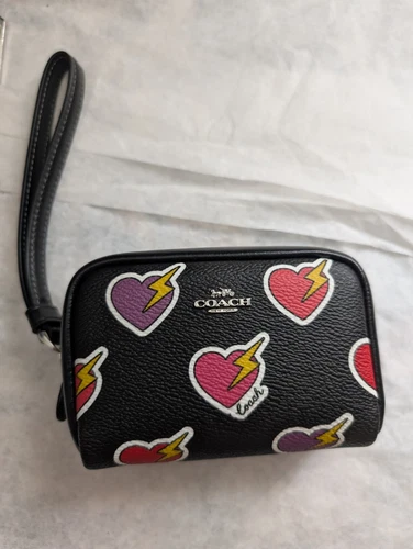 Polsino Coach nuovo con etichetta con stampa bullone cuore ?