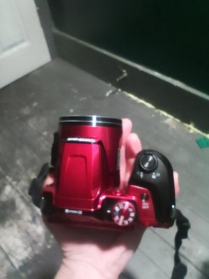 nikon camera and carrying bag. Used only couple times. Red with black neck strap