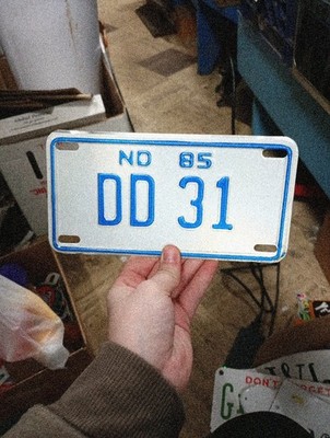 1985 North Dakota DD 31 Motorcycle Dealer License Plate