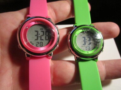 TWO SKMEI SPORT WATCHES GREEN & PINK LADIES' BOTH FIT UP TO 7 3/4'' WRIST BBA25B