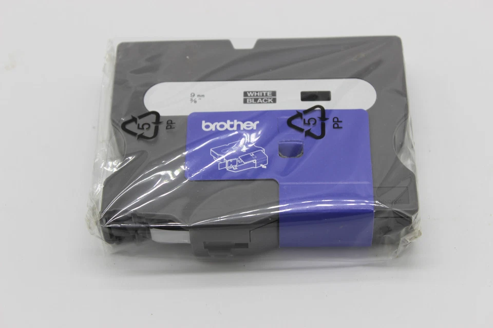 Genuine Brother TX-325 - 9mm x 15m Tape, White on Black, NOS - image 3 of 4