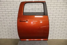 09-18 Ram 19-24 Ram Classic Crew Cab Right Rear Door Copperhead Pearlcoat PLB