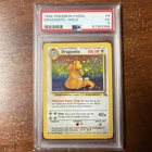 1999 POKEMON FOSSIL #4 DRAGONITE-HOLO PSA 5