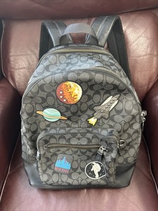 coach backpack with spaceship patches Camera Bag Nasa Space Rocket Patch in Chalk Smooth Leather – Essex Fashion House Capture urban edge with the Denim Tear 3 AM Patches backpack featuring distressed denim NASA Backpack: Black Spaceship Design,