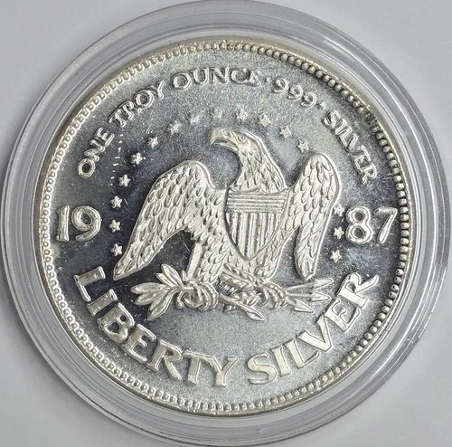 1987 1oz .999 Silver Life, Liberty Happiness A-Mark Round UNC