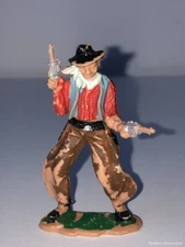 1059 - Reamsa Cowboy Cowboy Figure with Two 5.9cm Guns. comansi jecsan bad luck