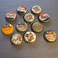 Bouchons de bouteille vintage d'occasion.  11 au total.