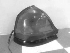 Used Left Lower Tail Light Assembly fits: 2001 Ford Crown victoria quarter panel