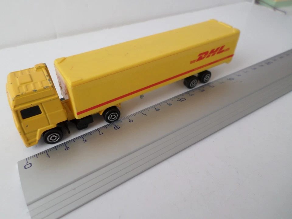 semi remorque sans marque modele fourgon dhl jaune - majorette - Photo 1/1