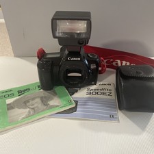 CANON EOS Rebel II Camera With Manual And Canon Strap And Speedlight Untested