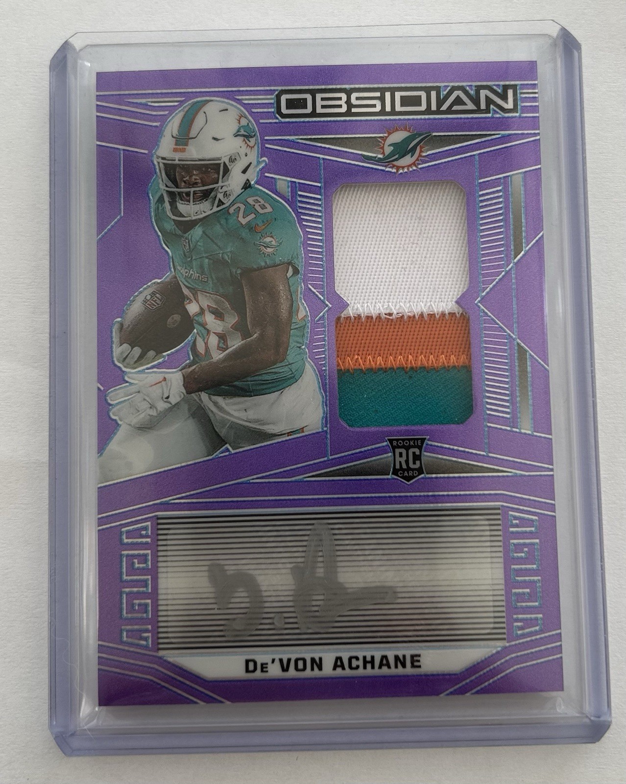 2023 Panini Obsidian #211 - Devon Achane Purple Flood /30 Rookie Patch Auto