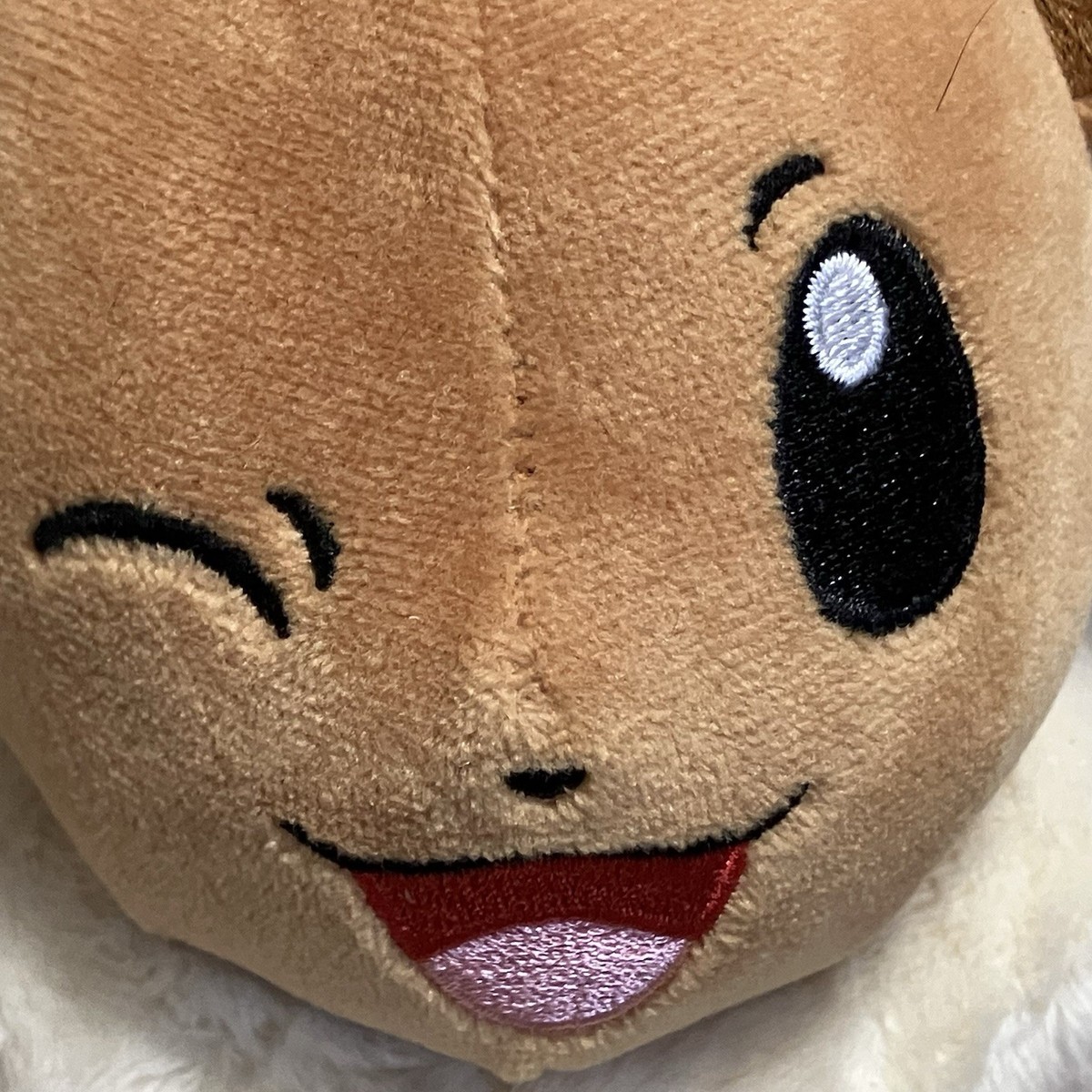 Pokemon Eevee Plush Toy 2023 Winking Face 8” Gaming Collectible