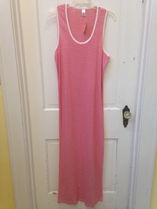 white sleeveless beach cover up