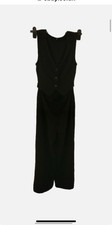 By Very Woman's new mid-cutout black jumpsuit. Size UK 10.RRP 48
