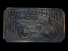 TC11123 VINTAGE 1974 INTERNATIONAL AUTO WAGON ADVERTISEMENT BELT BUCKLE