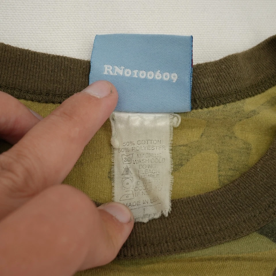 Camiseta Verde Camuflaje Comida Chatarra Adolescente con Estampado Elmo Talla Junior L Foto 4 de 4