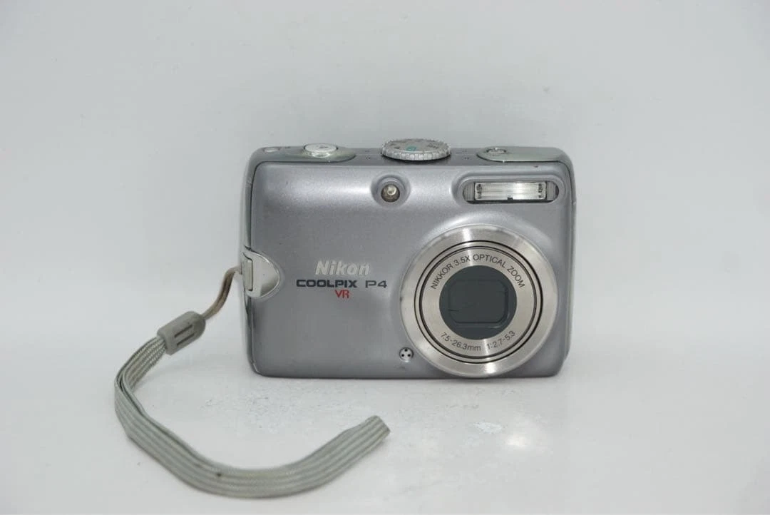 Nikon COOLPIX P4 VR Silver Compact Digital Camera Tested Working
