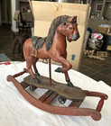 Hand Carved Wooden Rocking Horse Iron Wheels Stirrups horse 19” tall NO tail — photo 1