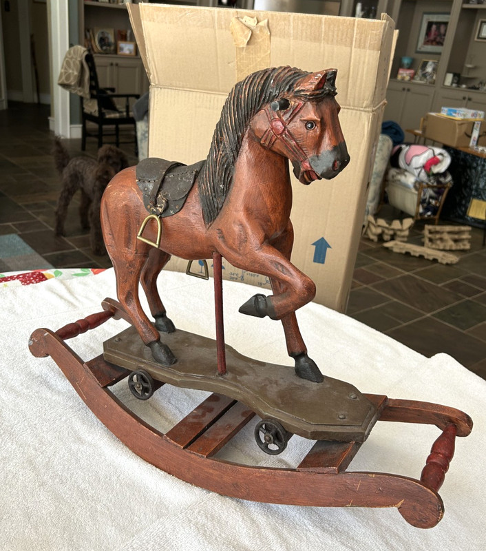Hand Carved Wooden Rocking Horse Iron Wheels Stirrups horse 19” tall NO tail