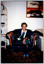 Vtg Color Snapshot Elderly Woman In Green Dress Sitting In Armchair 1990s