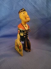 Vintage Popeye Tin Wind Up, Carrying Parrots,  Works when raised off surface!