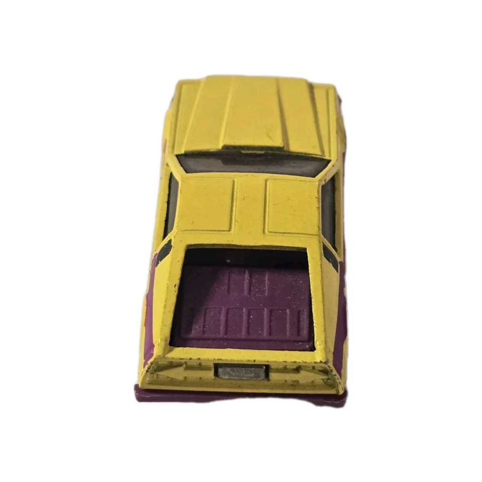 Vintage 1979 Hot Wheels Turismo Delorean Yellow  And Purple with racing stripes - Image 4 of 4
