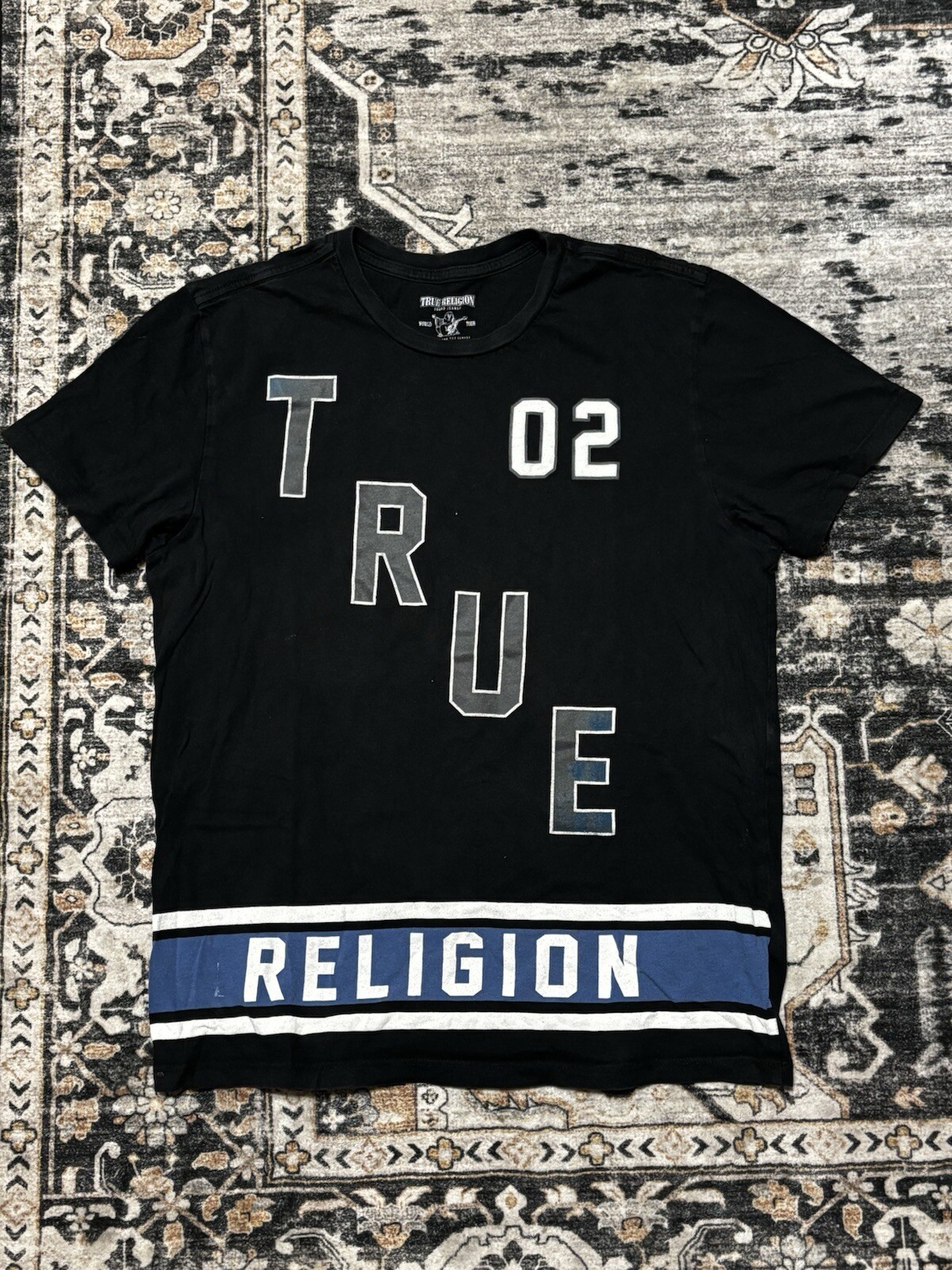 Black True Religion short sleeve tee with bold front design