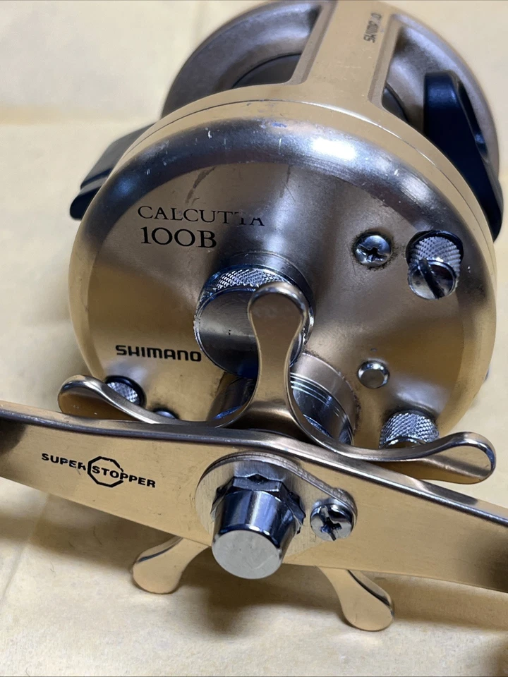 Carrete de pesca Shimano Gold Calcutta 100B Baitcasting Carbontex Drag envío gratuito Foto 3 de 4
