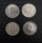 *LOT OF 4- SILVER KENNEDY HALF DOLLARS 90% SILVER*
