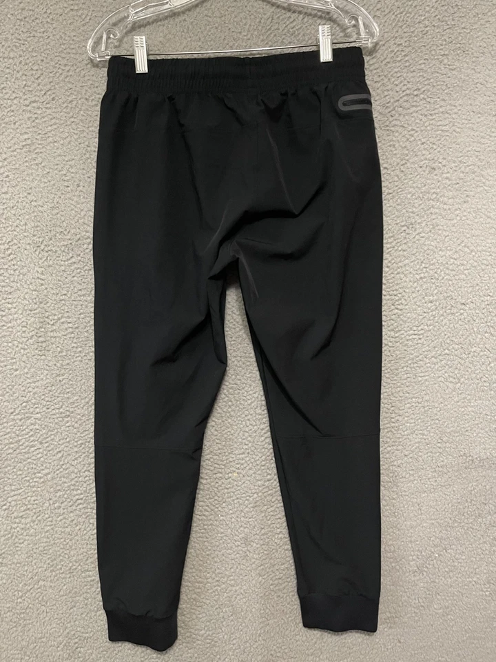 Pantalones de chándal Under Armour para mujer medianos UA Sportstyle Elite negros para correr Foto 3 de 4