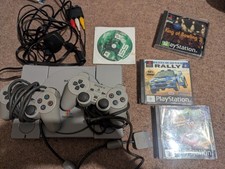 Sony PlayStation Grey Console 2 controllers and games