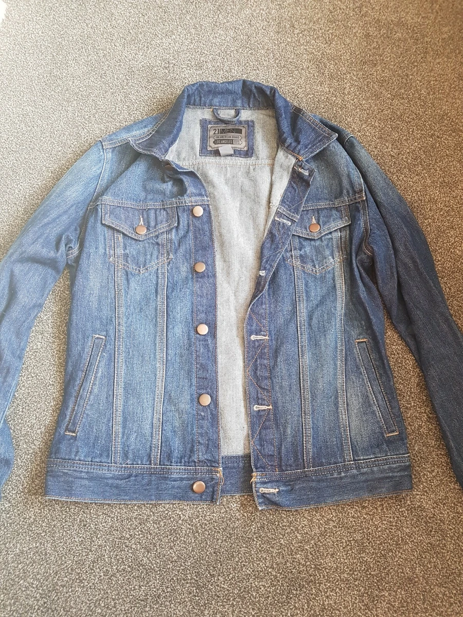 Blue distressed denim jacket sales