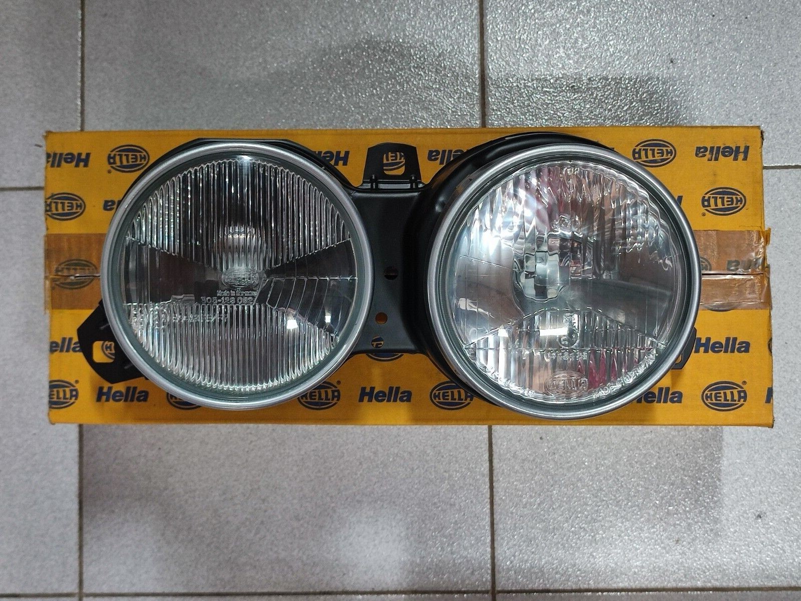 BMW E30 headlight right Euro Hella !!NEW!! OEM 63121373562 