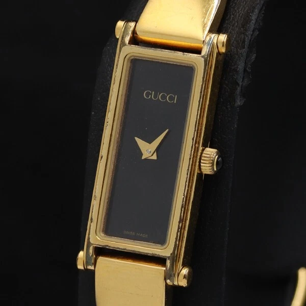 Montre bracelet femme à quartz Gucci 1500 L cadran noir or fabriquée en stock
