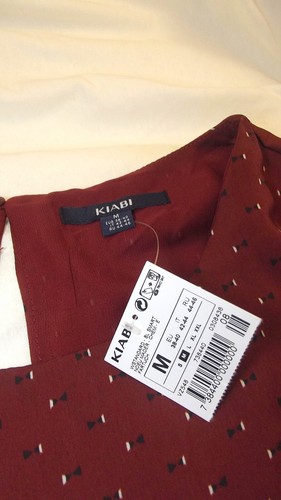 Kiabi Blusa Donna Effetto Raso Scollatura Rotonda Stmapa All Over Senza Maniche - Imagen 34 de 58
