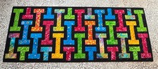 Quilted Batik Runner in Brights on Black - size 13" x 32"