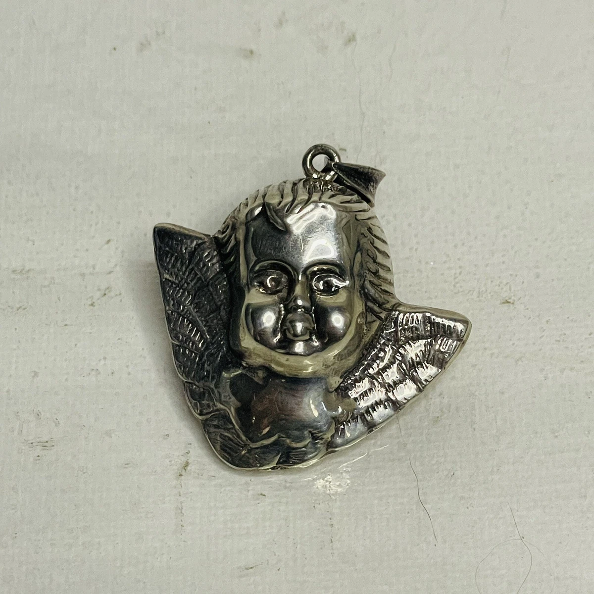 Cherub necklace silver deals