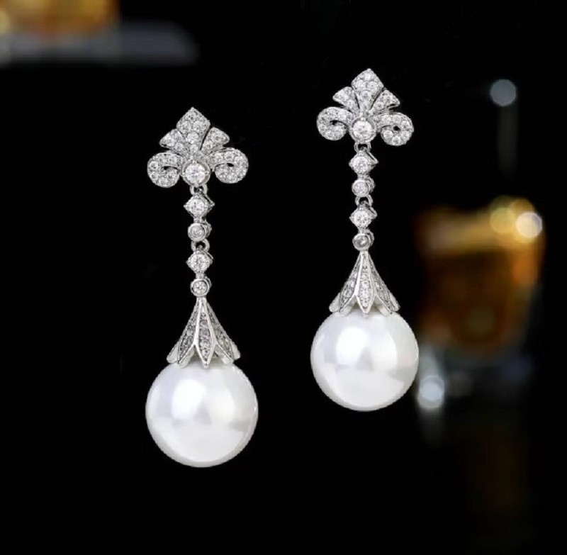 Boucles d'oreilles argent massif et zircon taille diamant, l'excellence de la joaillerie