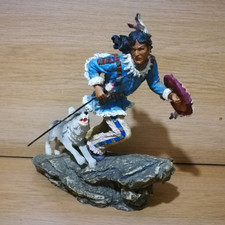 Native American Indian hunter chased by wolf 24cms tall resin figure ornament