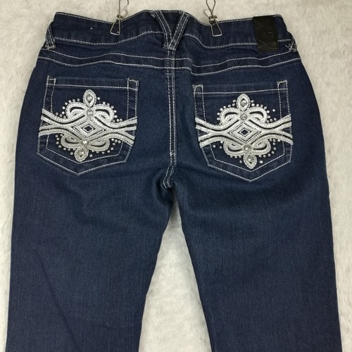 Jeans Vanity para mujer corte bota curvilíneo azul índigo enjuague punto blanco alto 27 - Imagen 3 de 12