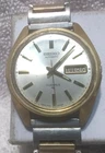 Seiko Automatic 17 Jewels Day Date 7006-8007 Silver Gold Flex Clear Works Men