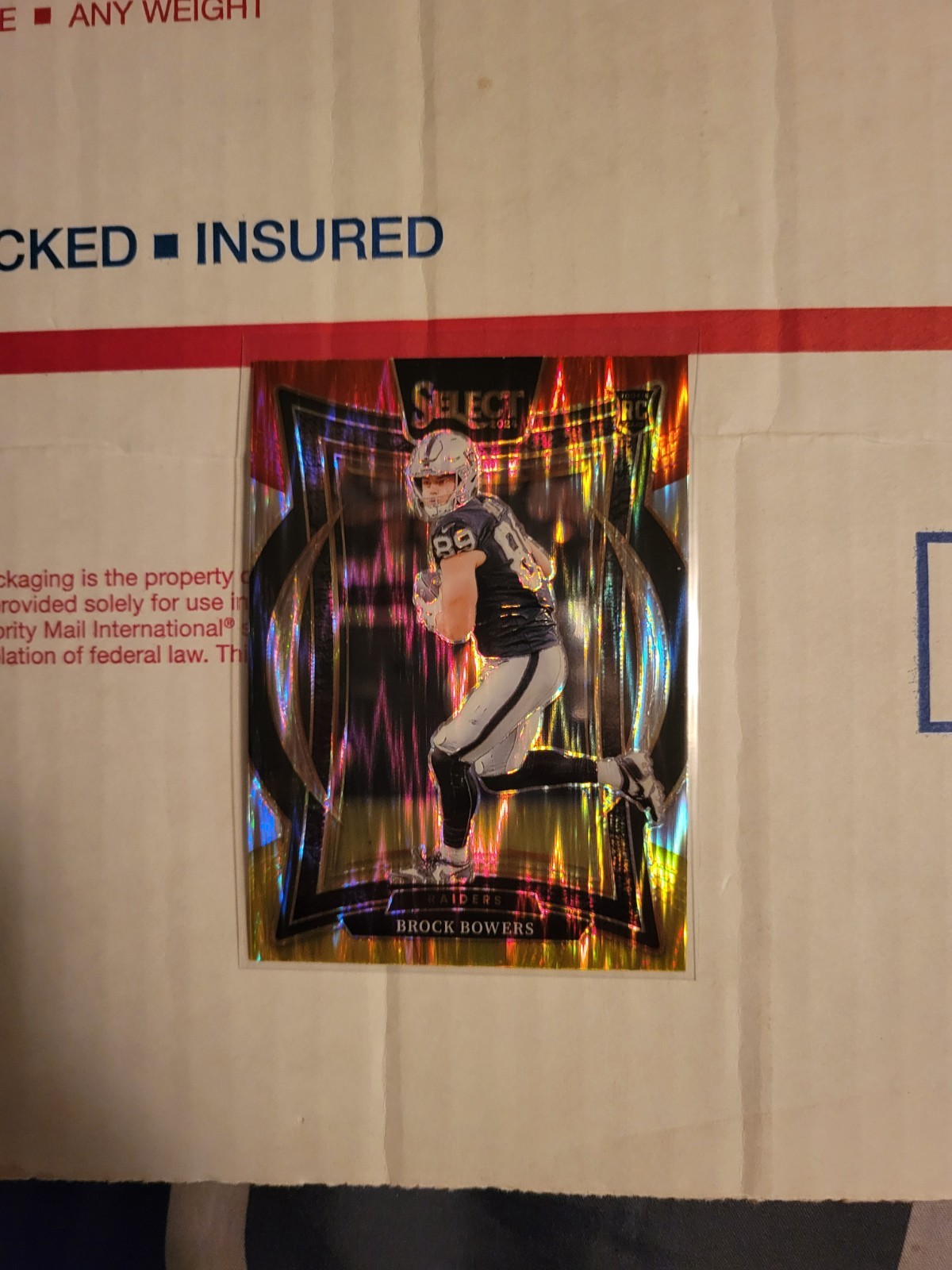 2024 Panini Select - Concourse Brock Bowers #31 Red & Yellow Shock Prizm (RC)