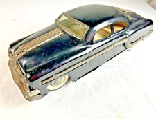 DELHI 1953 PONTIAC TIN FRICTION TOY CAR