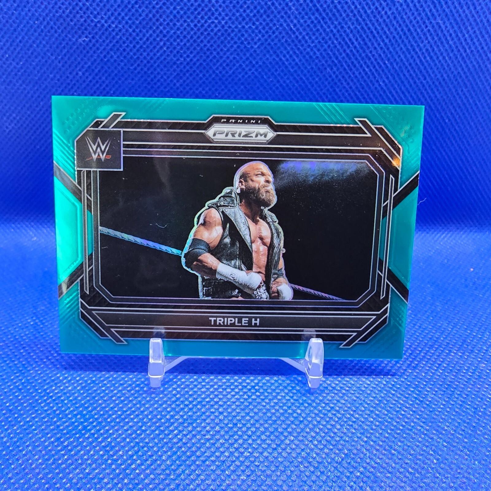 Triple H 2023 Panini Prizm WWE Teal Prizm #71 Wrestling Card /49