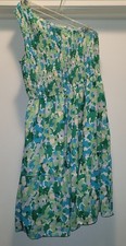 Green floral midi DRESS by Qaeral smocked bodice with a ruffled skirt M