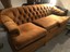 sofamania exp257-3s scroll arm kuche sofa. condition is "used". vintage style.