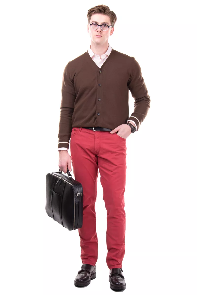 A Young Man in Red Long Sleeve Shirt and Brown Pants Wearing Black Hat ·  Free Stock Photo