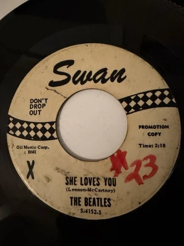 The Beatles 45 Promo Swan - White Label w/Black Print “She Loves You'' Worn