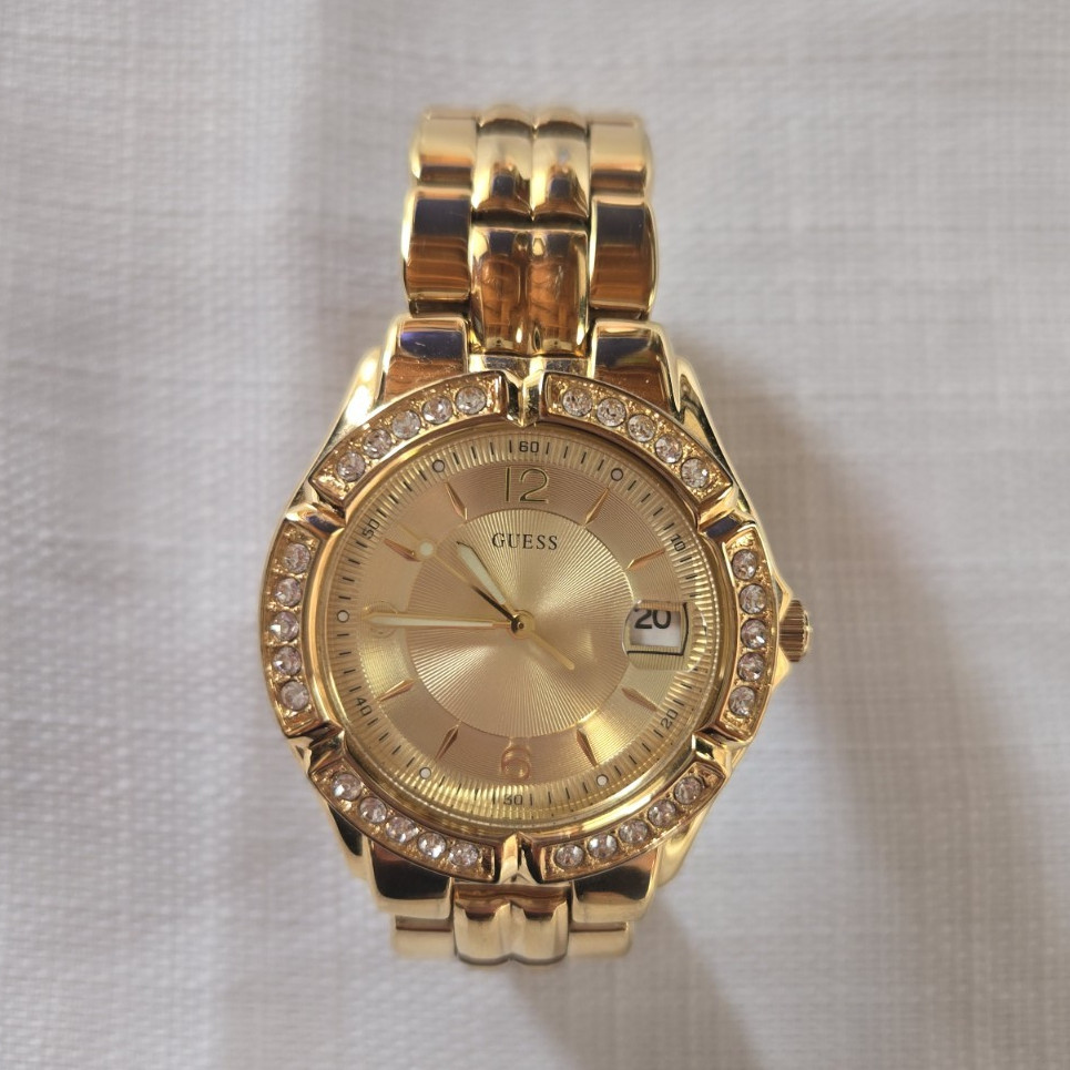 GUESS Women's Gold Tone Analog Quartz Watch Date Gem-Set Bezel Bracelet
