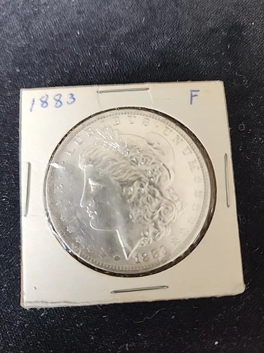 1883 CC MORGAN SILVER DOLLAR IN UNCIRCULATED CONDITION NICE TONE